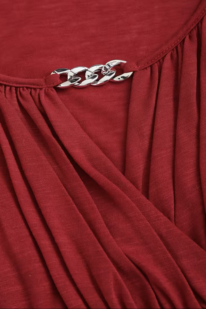 Heart Buckle Belted Plus Size Top with Irregular Hem and Long Sleeves