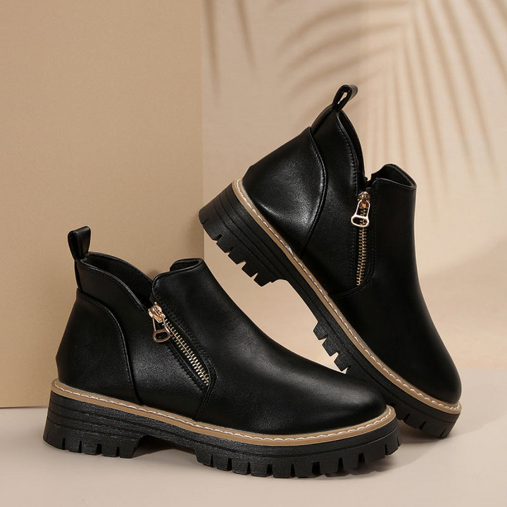 Black ankle boots worn - Elma Boutique